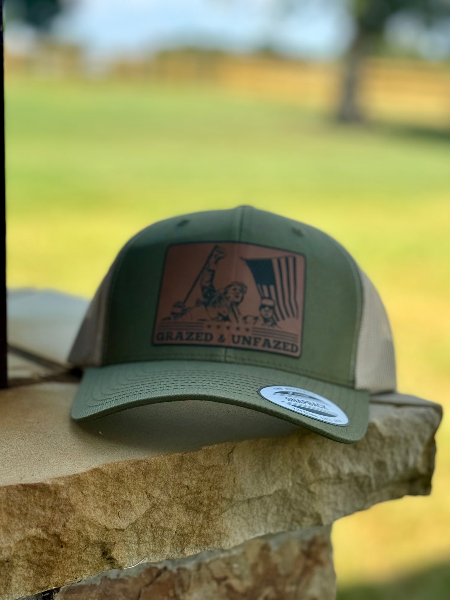 Grazed and unfazed Trump hat
