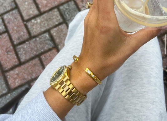 Gold cuff bangle